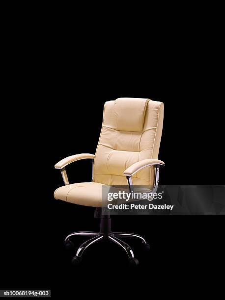 office chair on black background - back of chair stock pictures, royalty-free photos & images