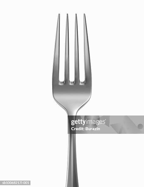 silver fork on white background, close-up - fork foto e immagini stock