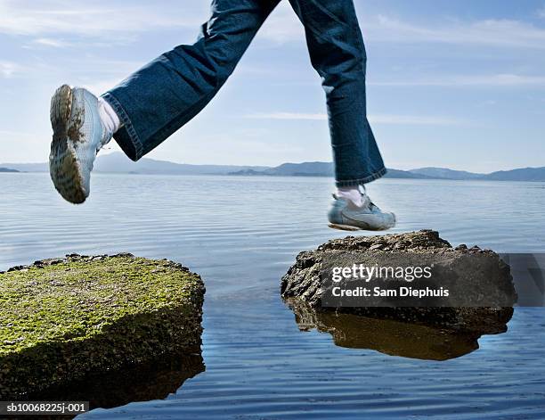 Stepping Over Rocks Kids Jumping Over Rocks Photos and Premium High Res Pictures - Getty Images