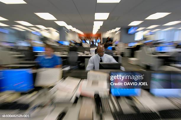 salesmen working at computers in office - retail event stock pictures, royalty-free photos & images