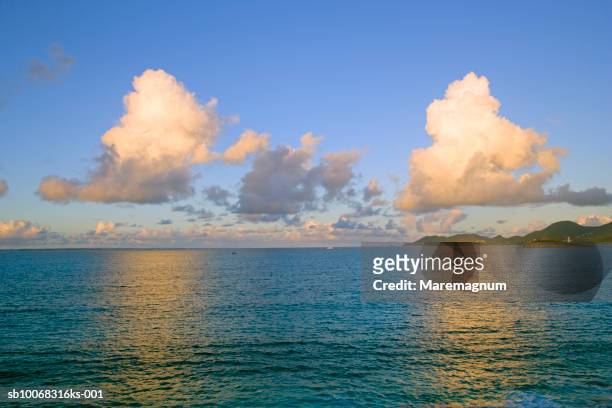 caribbean, west indies, st.martin island, clouds reflecting in water - saint martin caraibi stock-fotos und bilder