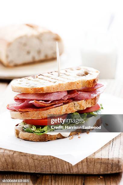 sandwich on cutting board - brotzeitbrett stock-fotos und bilder