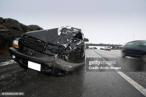 car accident on wet road - roadside challenge stock pictures, royalty-free photos & images