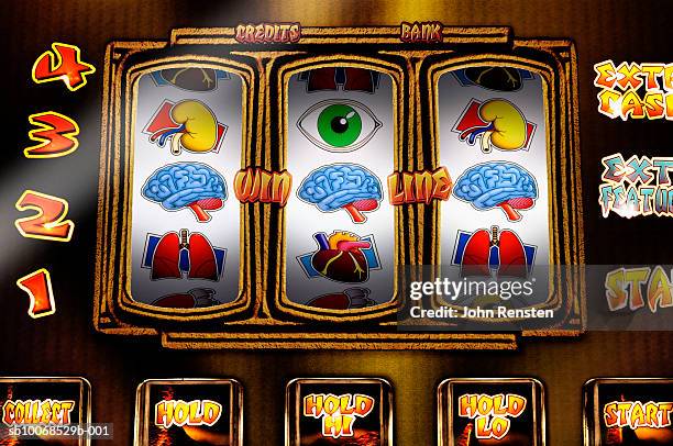 fruit machine with health and physical themed reels, close up - fruit machine stock pictures, royalty-free photos & images