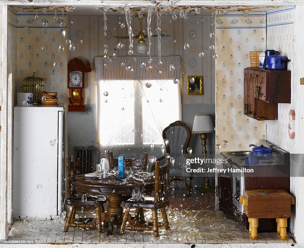 Flooded house and ceiling leaking water into kitchen