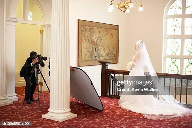 photographer photographing bride - wedding photographer stock pictures, royalty-free photos & images