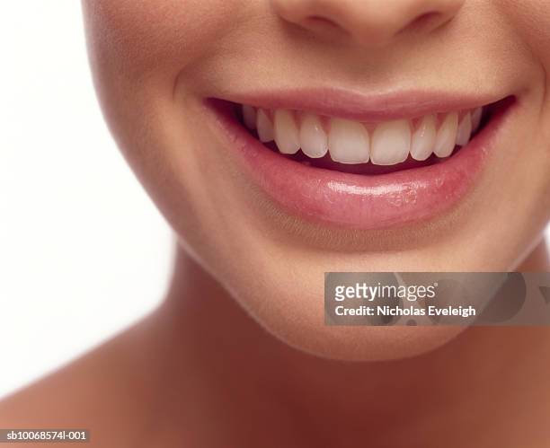 detail of young woman smiling - smile lips mouth stock pictures, royalty-free photos & images