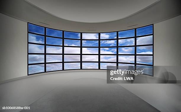 cloudy sky on multiple television monitors - tv on wall stock pictures, royalty-free photos & images