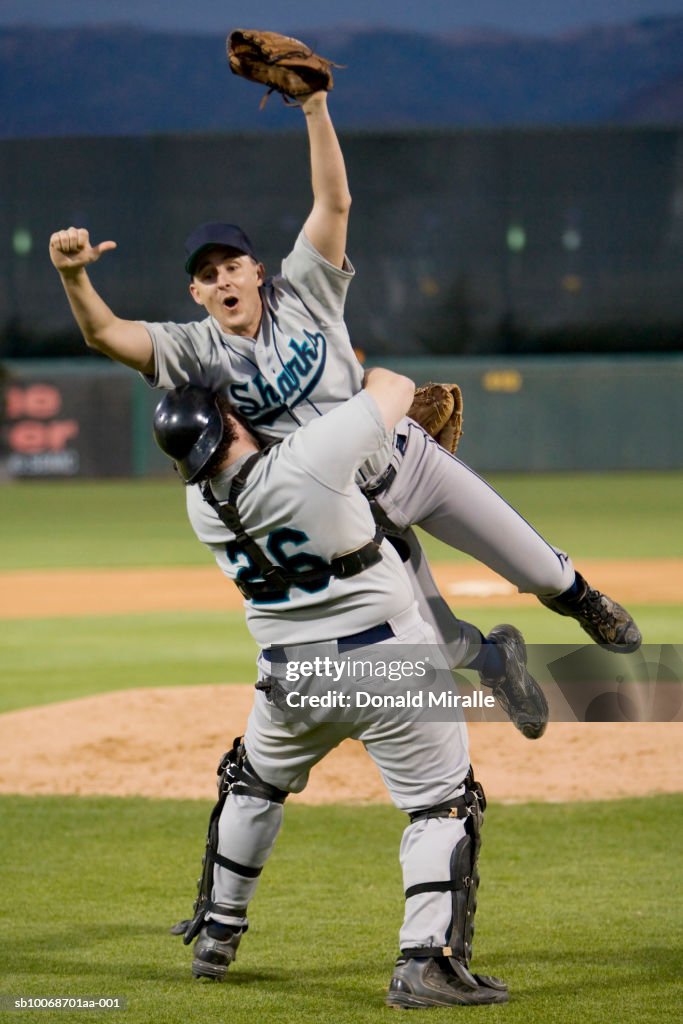 USA, California, San Bernardino, baseball players celebrating victory