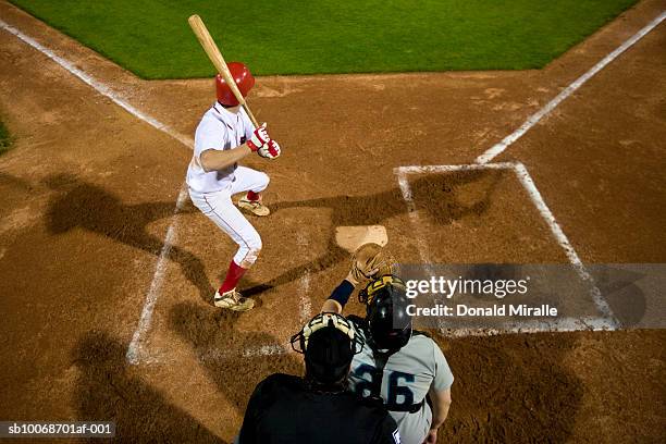usa, california, san bernardino, baseball players awaiting pitch during game - batsman stock pictures, royalty-free photos & images