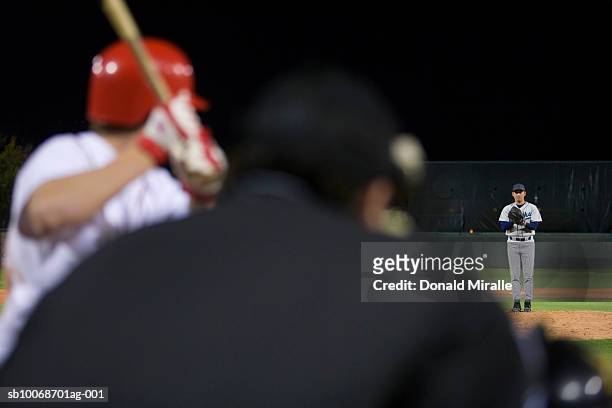 usa, california, san bernardino, baseball game, umpires view of batter awaiting pitch - baseball pitcher catcher stock pictures, royalty-free photos & images