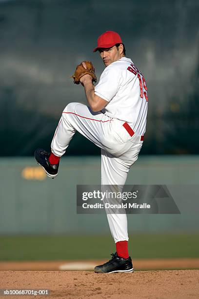 usa, california, san bernardino, baseball pitcher preparing to throw, outdoors - baseball player stock pictures, royalty-free photos & images