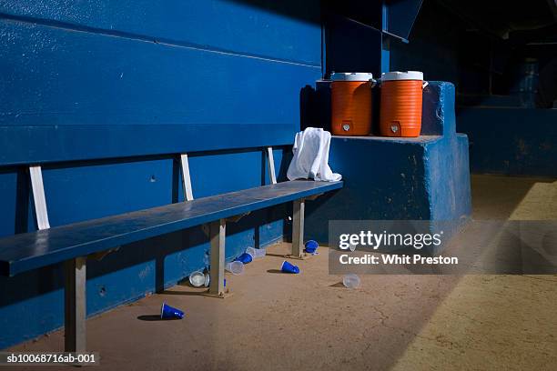 empty baseball dugout with water coolers - water cooler stock pictures, royalty-free photos & images