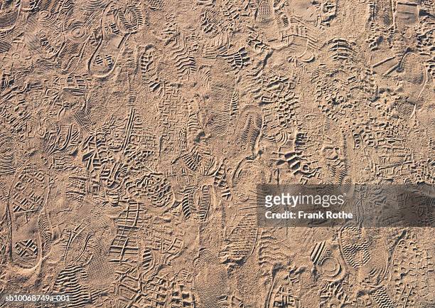 footprint on sand (full frame) - footprint stock pictures, royalty-free photos & images