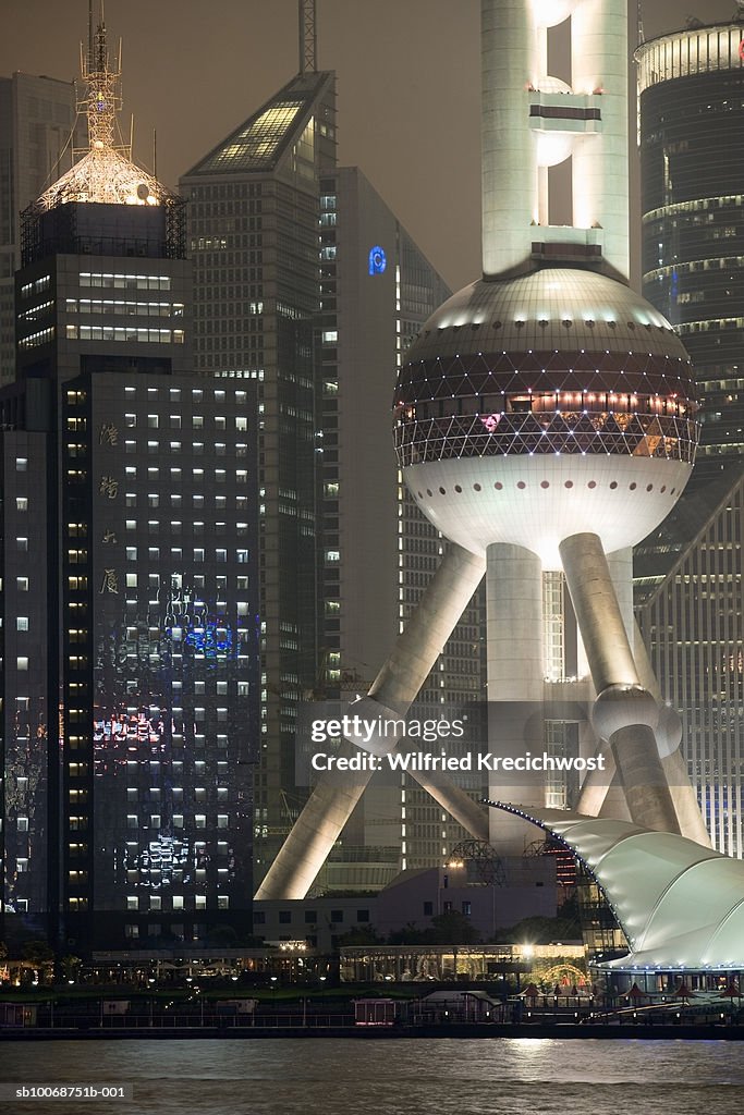 China, Shanghai, Pudong, Oriental Pearl Tower and skyscrapers at night