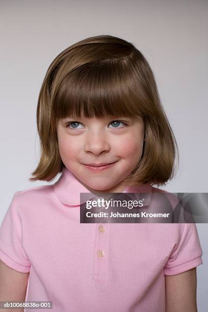girl (2-3) smiling, studio shot - 3 years brunette female alone caucasian stock pictures, royalty-free photos & images