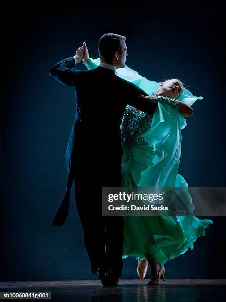 man and woman dancing - ballroom dancers stock pictures, royalty-free photos & images