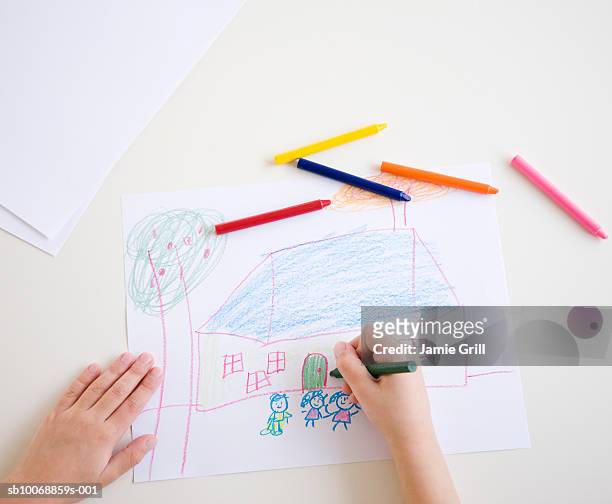 child's hands drawing picture, high angle view - child's drawing stock pictures, royalty-free photos & images