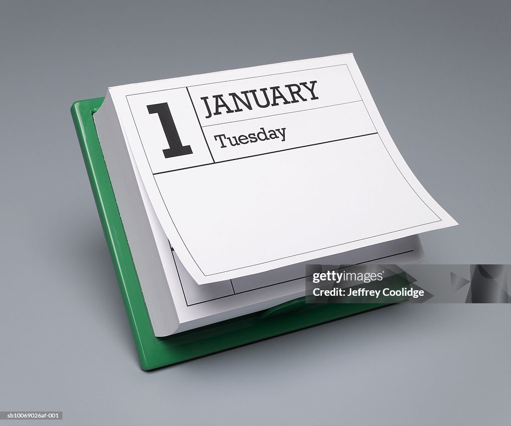 Desk calendar showing January 1st, studio shot