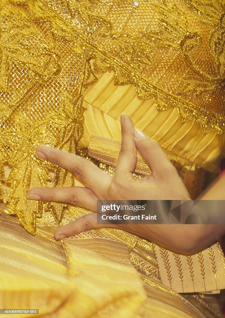 Thailand, Bangkok, woman performing traditional dance, close up of hand