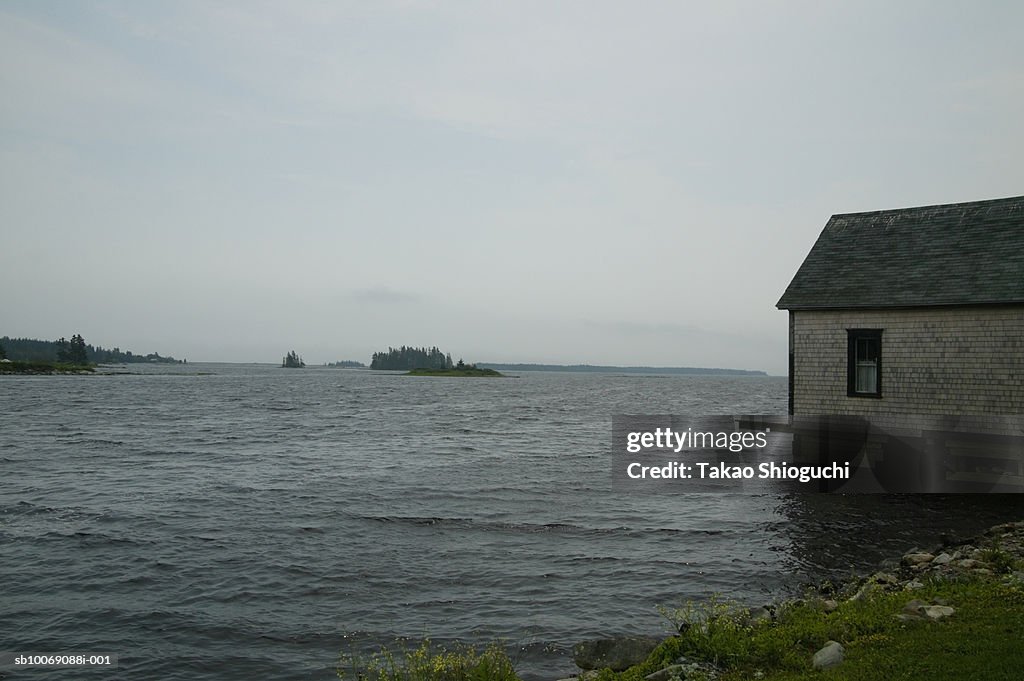 Canada, Nova Scotia, Lunenburg, Boathouse besides lake