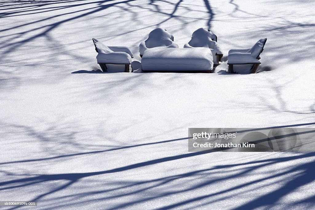 USA, Wisconsin, snowcovered garden table and chairs