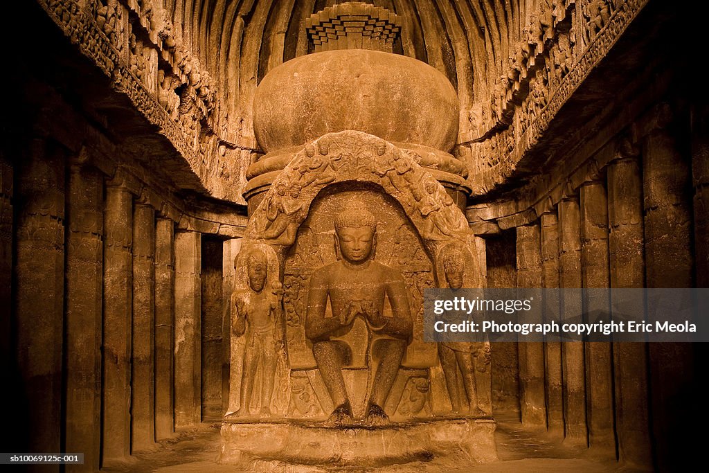 Statue of Buddha in cave