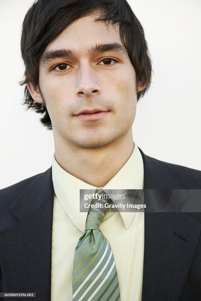 Young businessman, close-up, portrait