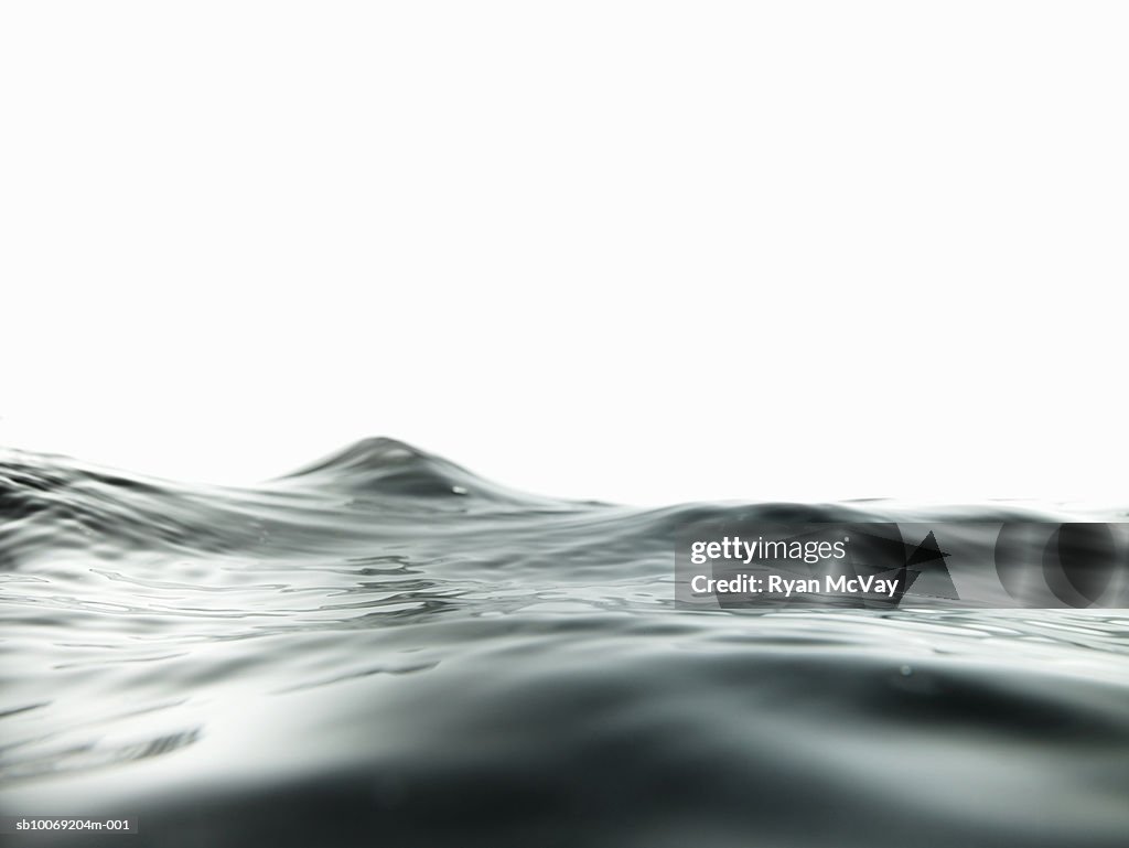 Water surface with waves, close-up (coy space)