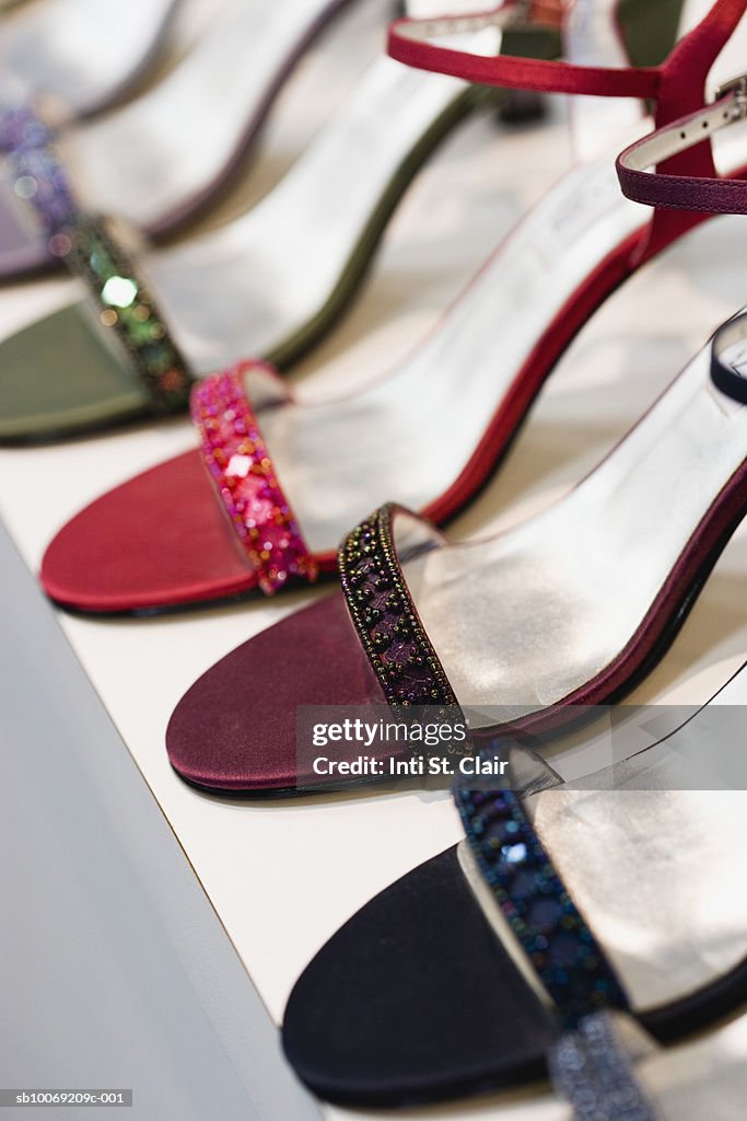 Row of various high heeled shoes, close up