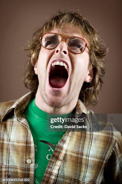 young man yelling, close-up - man open mouth stock pictures, royalty-free photos & images