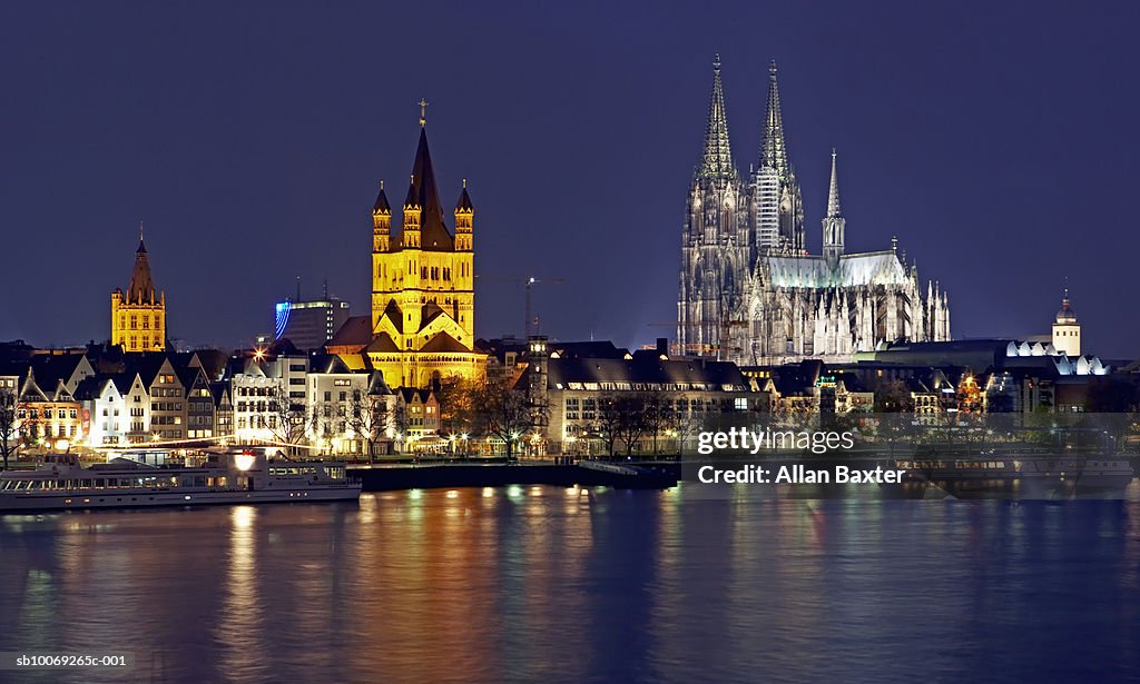 Germany, Cologne, Skyline with Cologne cathedral and Gross St Martin at night