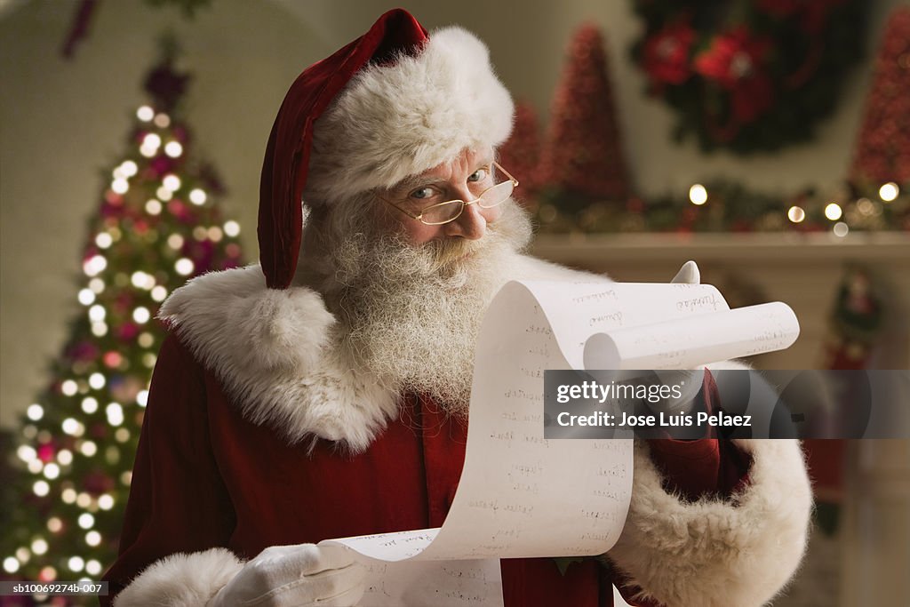 Santa Claus with checklist, portrait, close-up