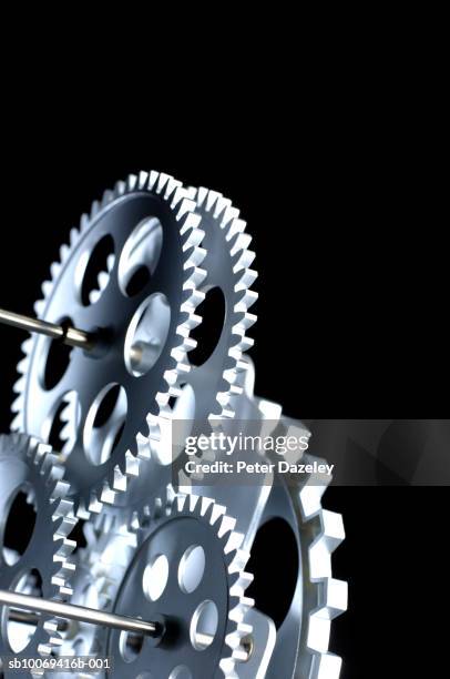 clock gears, close-up - co ordination stock pictures, royalty-free photos & images