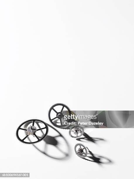 clock gears. on white background, close-up - co ordination stock pictures, royalty-free photos & images
