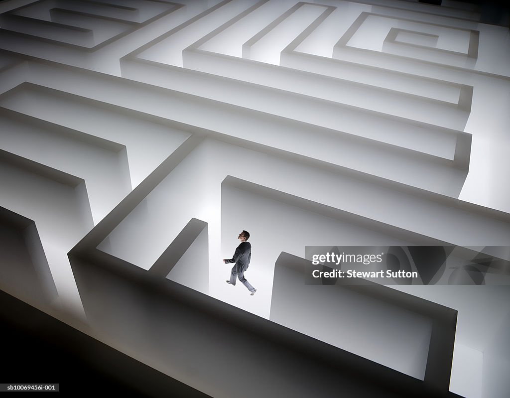 Man walking in giant maze