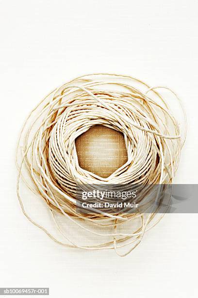Unspiraling String Unwinding Ball Of String Studio Shot High-Res Stock Photo - Getty Images