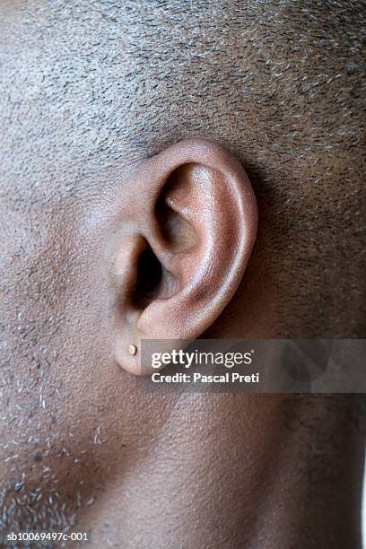 close up of man's ear - örhänge bildbanksfoton och bilder