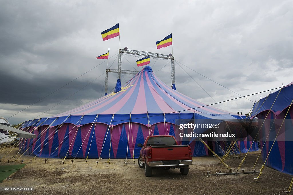 Circus tent under overcast sky