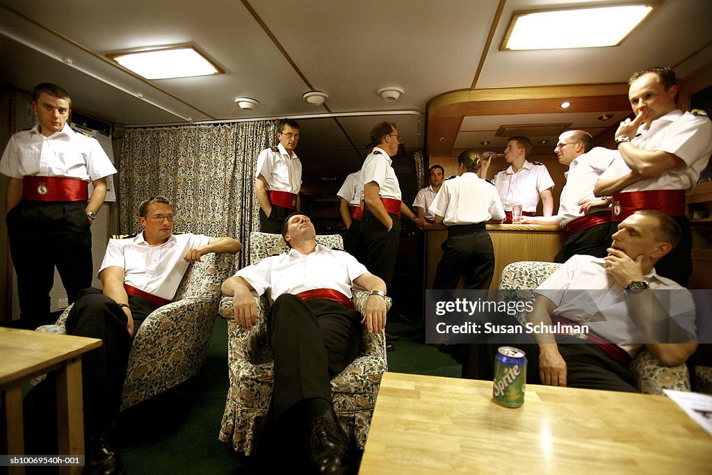 Navy Officers relaxing in wardroom