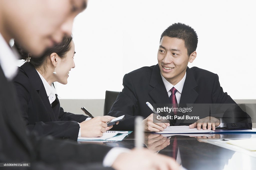 Business executives at conference table