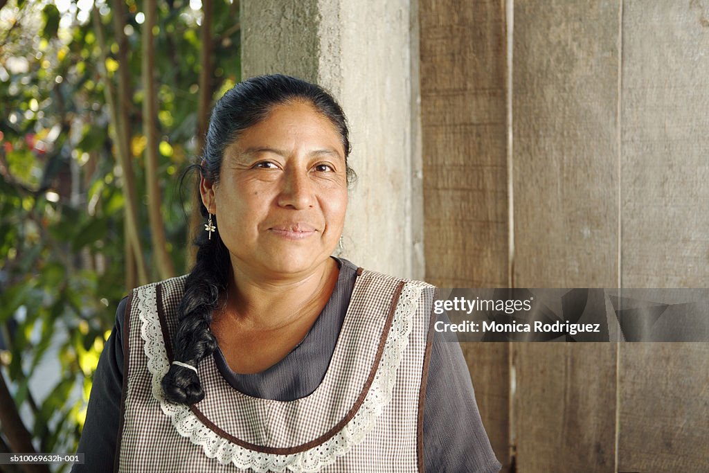 Mexico, Oaxaca, Portrait of mature woman wearing apron