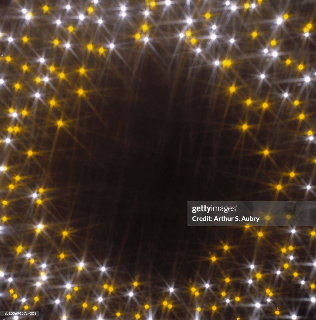 Twinkling circle of lights, digitally generated