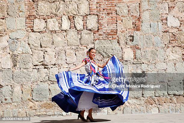 mexico, oaxaca, istmo, woman in traditional dress dancing - oaxaca stock pictures, royalty-free photos & images