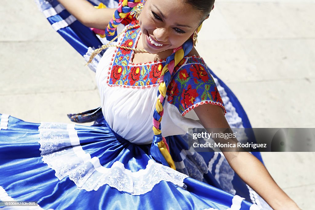 Mexico, Oaxaca, Istmo, woman in traditional dress dancing
