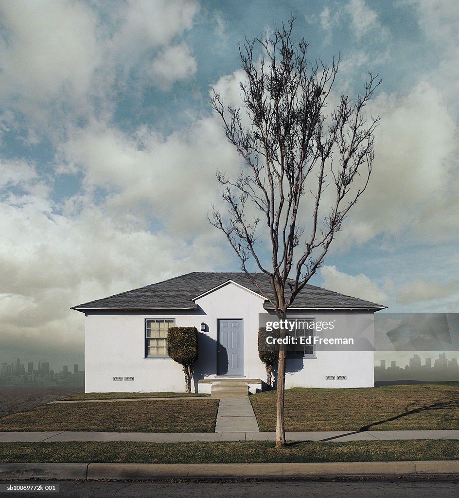 Exterior view of suburban house, digital composite