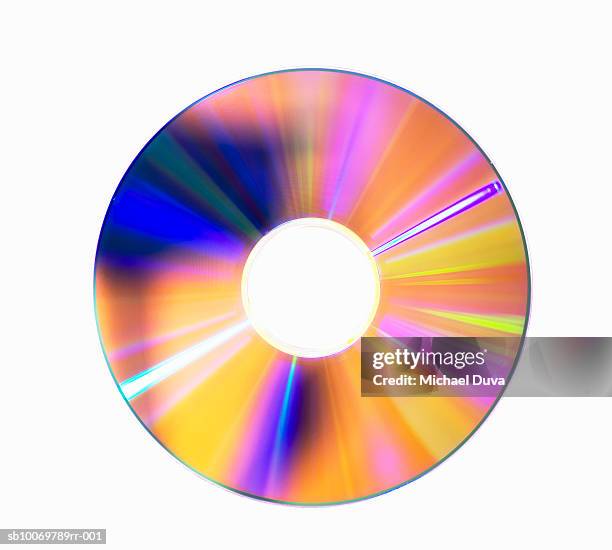 compact disc on white background - colorful cd photos et images de collection