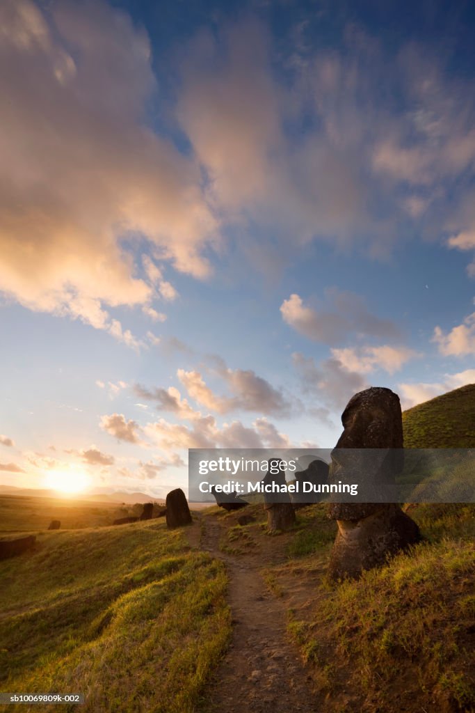 Chile, Easter Island, Rano Raraku, Moai statues at dusk