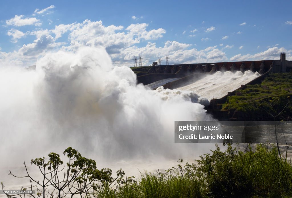Brazil, Itaipu Dam, Water flowing over spillway of dam