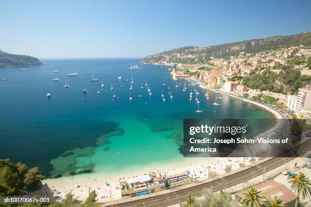 france, nice, miediteranean sea and beach - nice france stockfoto's en -beelden